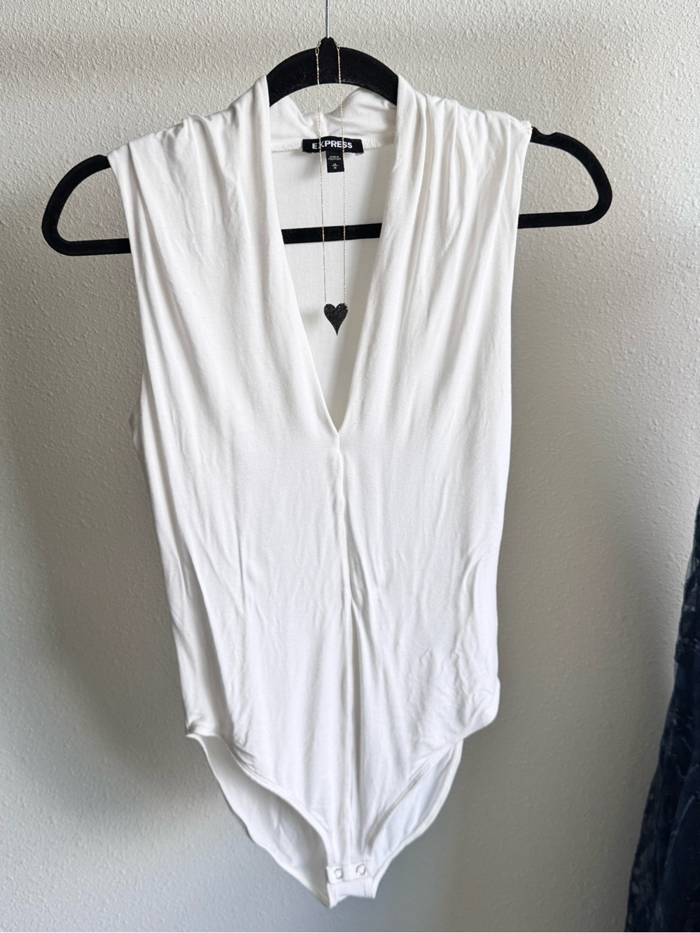 Express White Sleeveless V-Neck Bodysuit with Snap Closure